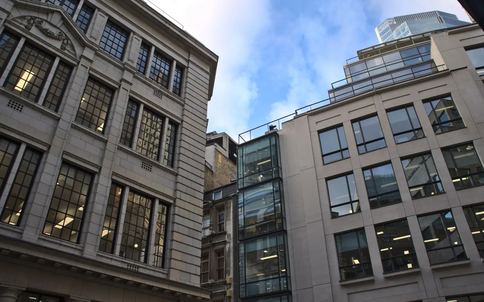 Stone and glass office buildings on Lime Street in the City of London